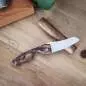 Vorschaubild: Fines Lames Le Petit Walnut Wood auf einem Tisch