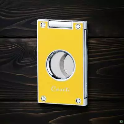 Produktbild: Caseti Paris Zigarrenschneider gelb auf Holz